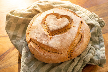 freshly baked bread with heart and love
