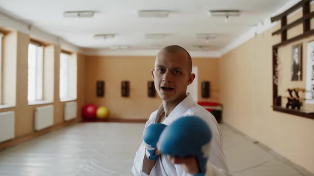Karate fighter trains martial arts skills