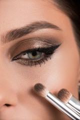 Naklejka premium Smokey makeup eyes. Makeup. Arrow makeup. Evening make-up