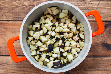 Step by step preparation of vegetable stew with potatoes and eggplant, step 2 - chopped eggplant in...