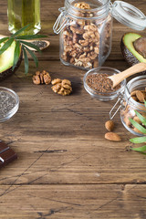 healthy fats sources flax nuts oil avocado chia seeds bitter chocolate . Concept of healthy food
