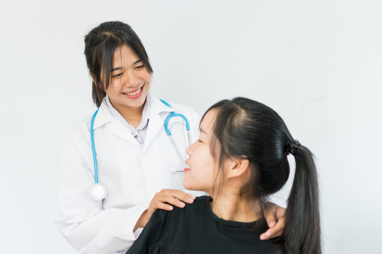 Young Asian Female Doctor Hand Holding Hands Of Teen Patient When Her Serious About Heartache, Depression, Heartbroken For Comforting For Peace Of Mind, Medicine Student Treatment In Hospital Concepts