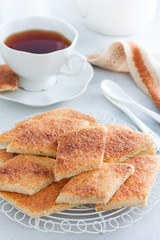 Traditional Jewish cookies with cinnamon and sugar Zemlyah, selective focus