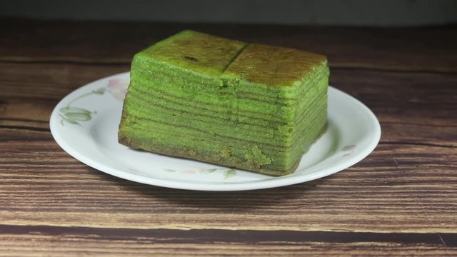 Slider zoom footage of evergreen "kek lapis Sarawak" or layer cake during Eid Mubarak.