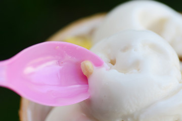 Ice cream with spoon closeup