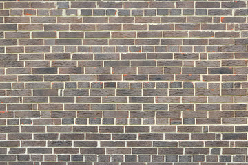 Brown background of beautiful unusual building brick