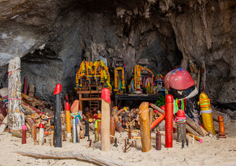Shrine and big wooden image of penis in the Phra Nang Cave at Krabi province, Thailand. © aaor_2550
