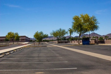 Fototapeta na wymiar Empty School Parking Lot Due Coronavirus Shut Down