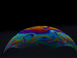 Warm and cold colored soap bubble