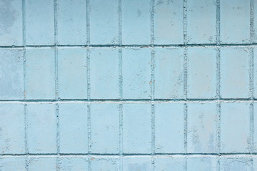 Beautiful vintage blue background with old blue paint with a rough surface, streaks and uneven...