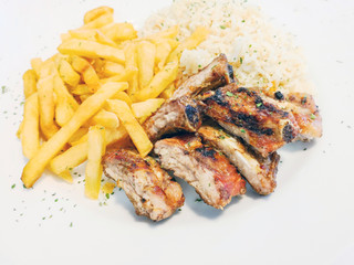 juicy grilled pork leg with French fries