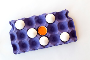 Many fresh raw chicken eggs in carton on white background, top view