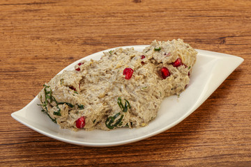 Vagan dietary cusine - mutabal with granet seeds