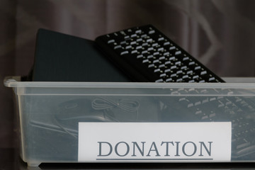 An example of responsible business: an office collection box for used computer parts to  be donated