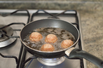 Fry meatball in the making.