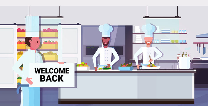 chef cook holding welcome back sign board coronavirus quarantine is ending victory over covid-19 concept restaurant kitchen interior horizontal portrait vector illustration