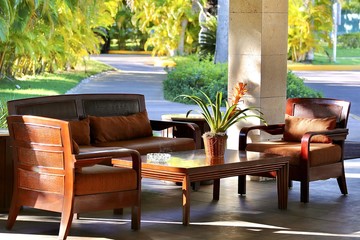 table and chairs on the terrace flowers on the table bride and groom holding hands wineglass wedding dress bride love married 