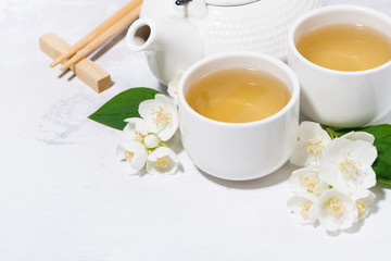 Obraz na płótnie Canvas japanese tea ceremony. green tea with jasmine