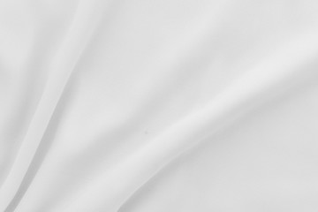 Luxury cloth texture with white fabric of silk for backdrop, wedding background. Seamless pattern of satin cotton.