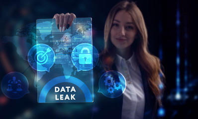 Business, Technology, Internet and network concept. Young businessman working on a virtual screen of the future and sees the inscription: Data leak