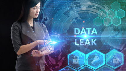 Business, Technology, Internet and network concept. Young businessman working on a virtual screen of the future and sees the inscription: Data leak