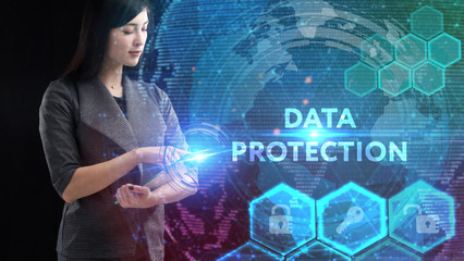 Business, Technology, Internet and network concept. Young businessman working on a virtual screen of the future and sees the inscription: Data protection