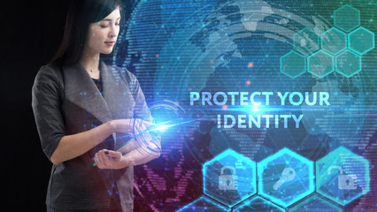 Business, Technology, Internet and network concept. Young businessman working on a virtual screen of the future and sees the inscription: Protect your identity