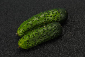 Ripe fresh green two cucumbers