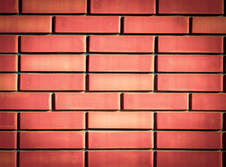 Obraz premium Red brick wall. brick wall texture. Vintage red clay brick wall background in traditional common bond pattern