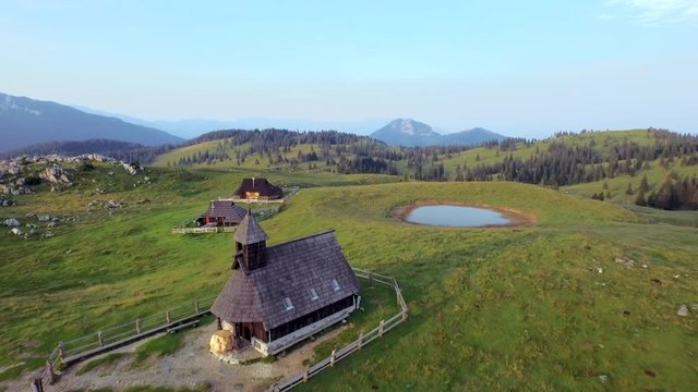 VELIKA PLANINA, SLOVENIA - JULY 23, 2015: Velika Planina is a dispersed high-elevation settlement of mostly herders' dwellings on the karst Big Pasture Plateau in the Kamnik Alps in Upper Carniola