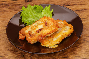 Roasted cod fish in bread