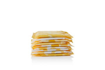 Fototapeta premium yellow female menstrual pads isolated on white background. Feminine hygiene products