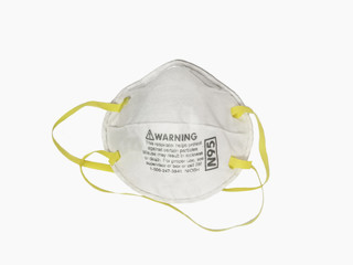White N95 face mask on white background Yellow ear canal, concept to prevent diseases and pollution