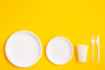 plastic spoon on a yellow background