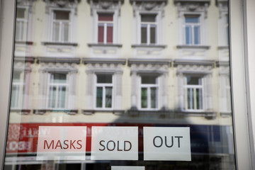 sold out sign for protective masks in a shop window in Vienna