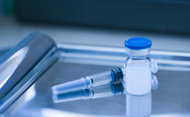 New vaccine covid-19 vial dose flu shot drug needle syringe,concept medical test vaccine...