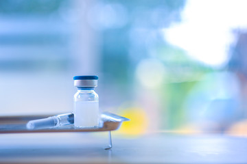 New vaccine covid-19 vial dose flu shot drug needle syringe,concept medical test vaccine coronavirus hypodermic injection treatment disease prevention immunization illness disease.selective focus.