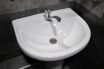 White washbasin in a restaurant. 25 May 2020. Minsk, Belarus