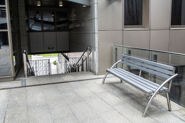 Modern bench in a granite hall in an office building. 24 May 2020. Minsk. Belarus