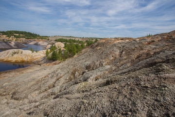 Amazing kaolin clay marsian landscape quarry open pit at summer day