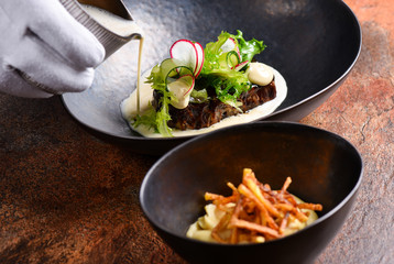 Baked lamb with sweet potato and vegetable
