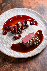 Fine dining Venison Steak with Cherries and Port Sauce