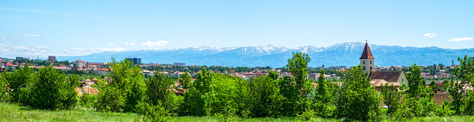 Fototapeta na wymiar panoramic view over the Sibiu city and Fagars mountains, Romania 