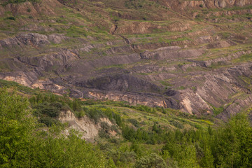 Abandoned coal ore quarry open pit