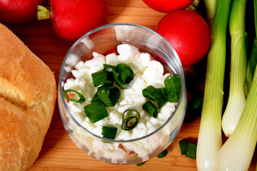 white cottage cheese and red radish whole and finely chopped and chopped chives