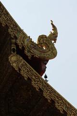 Fototapeta na wymiar Gable roof of the church in Wat Sri Ping Muang, Chiangmai province, Northern Thailand.