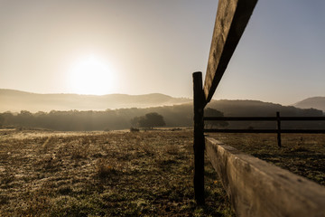 wooden fence on a farm in the Serrania de Cadiz in Grazalema during the morning