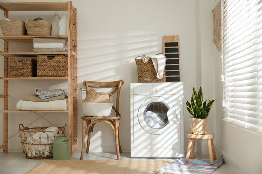 Modern Washing Machine In Laundry Room Interior