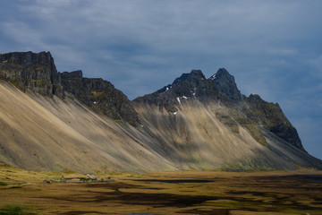 The Vestrahorn mountain on the Icelandic coast jut directly out of the ocean