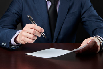 businessman sign a document. business contract or agreement concept.